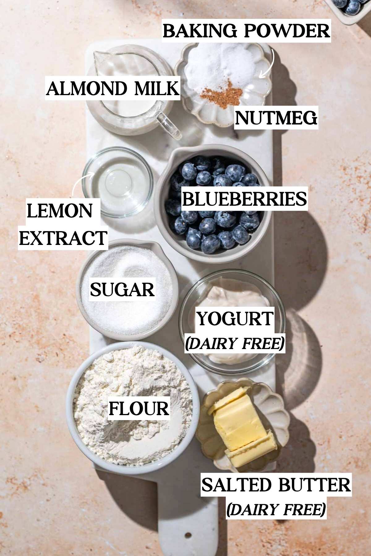 ingredients like flour, blueberries, butter and yogurt.