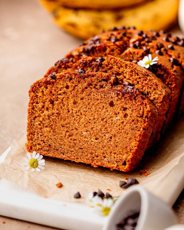 the best vegan pumpkin banana bread with chocolate chips on top.