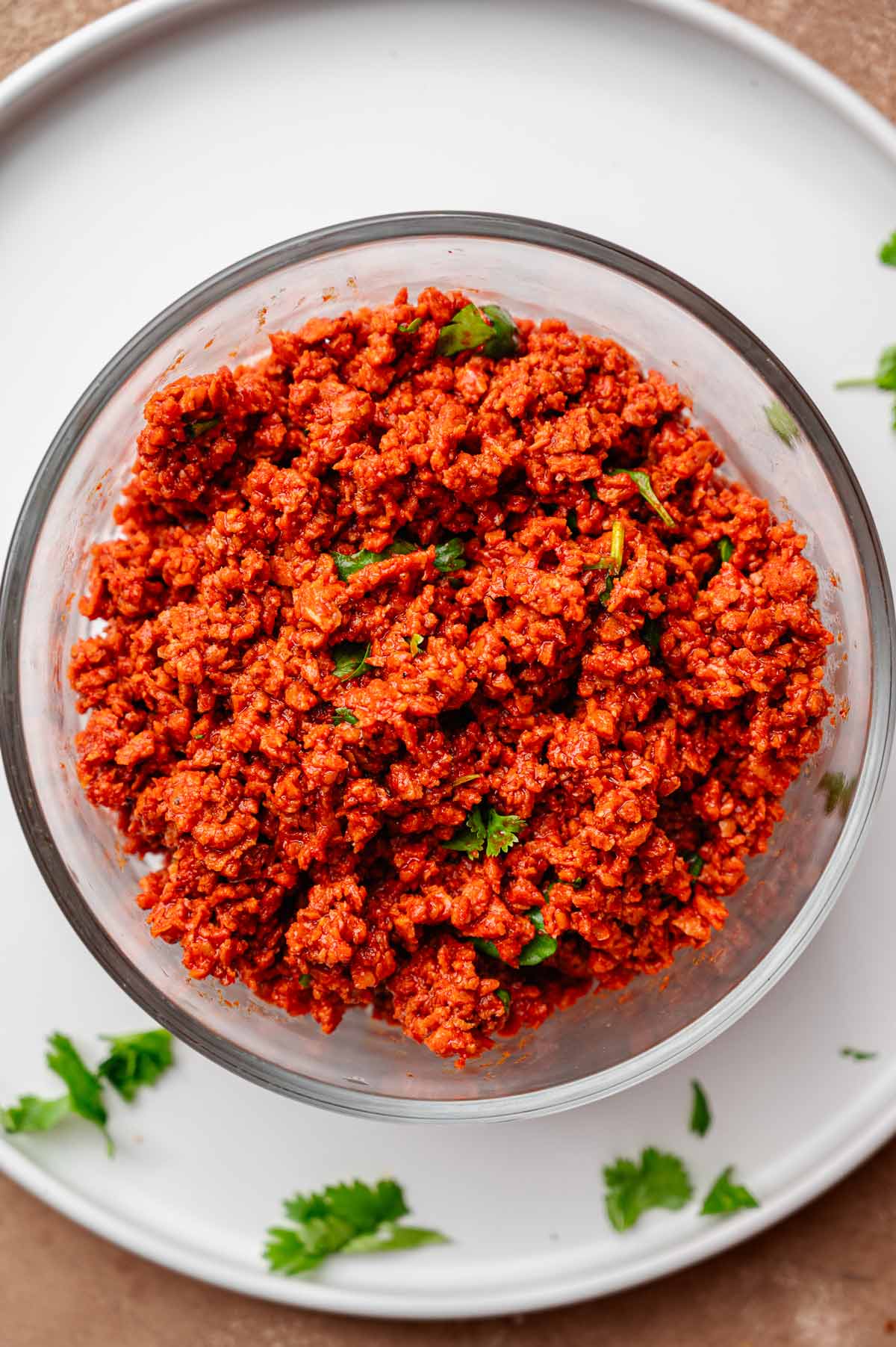 the vegan chorizo in a glass Tupperware container.