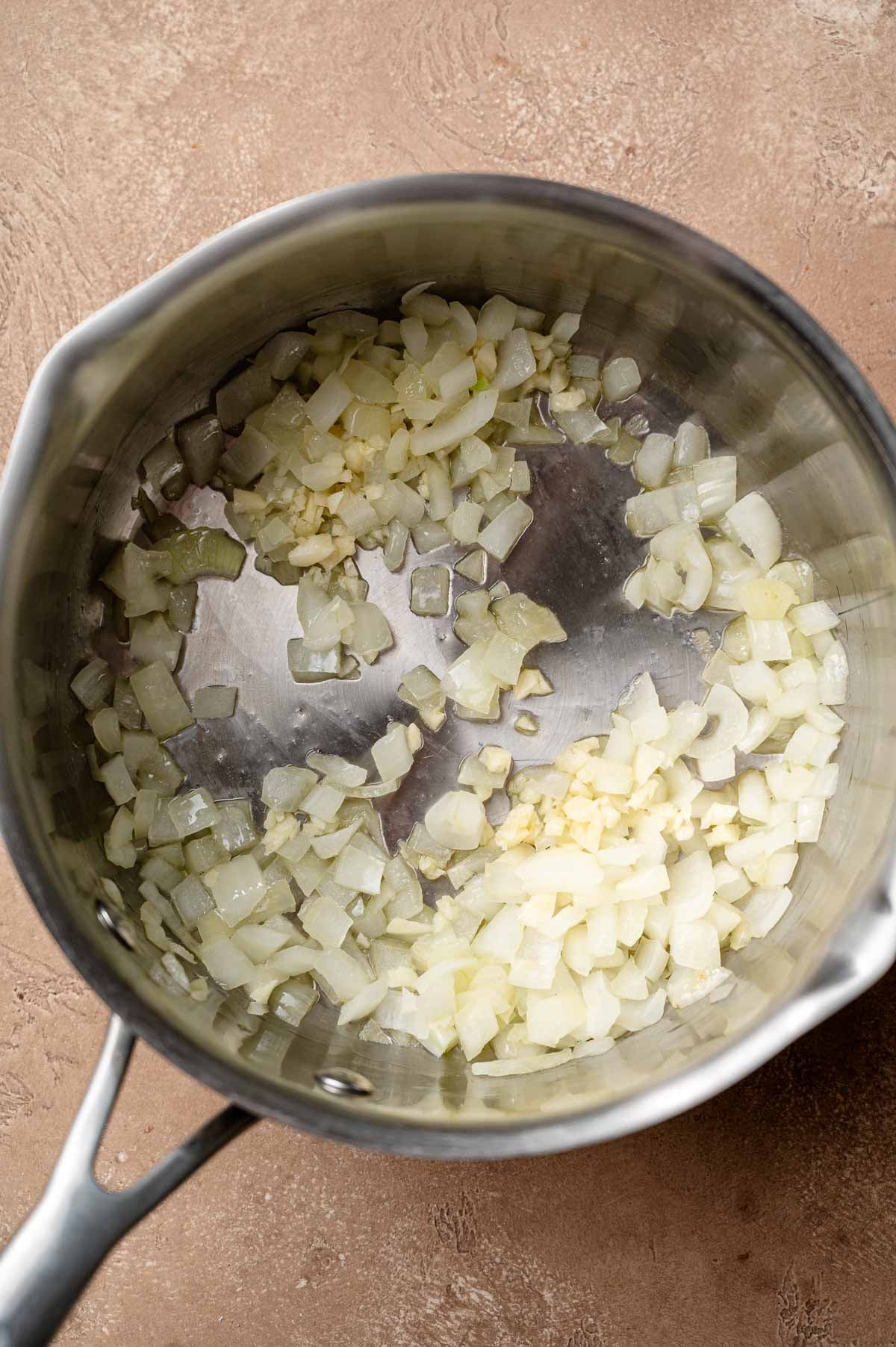 onion and olive oil in a stainless steel pot.