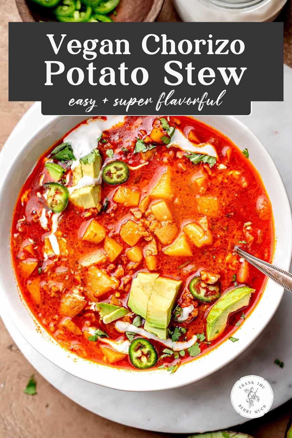 an image of vegan potato stew with chorizo with a text overlay.