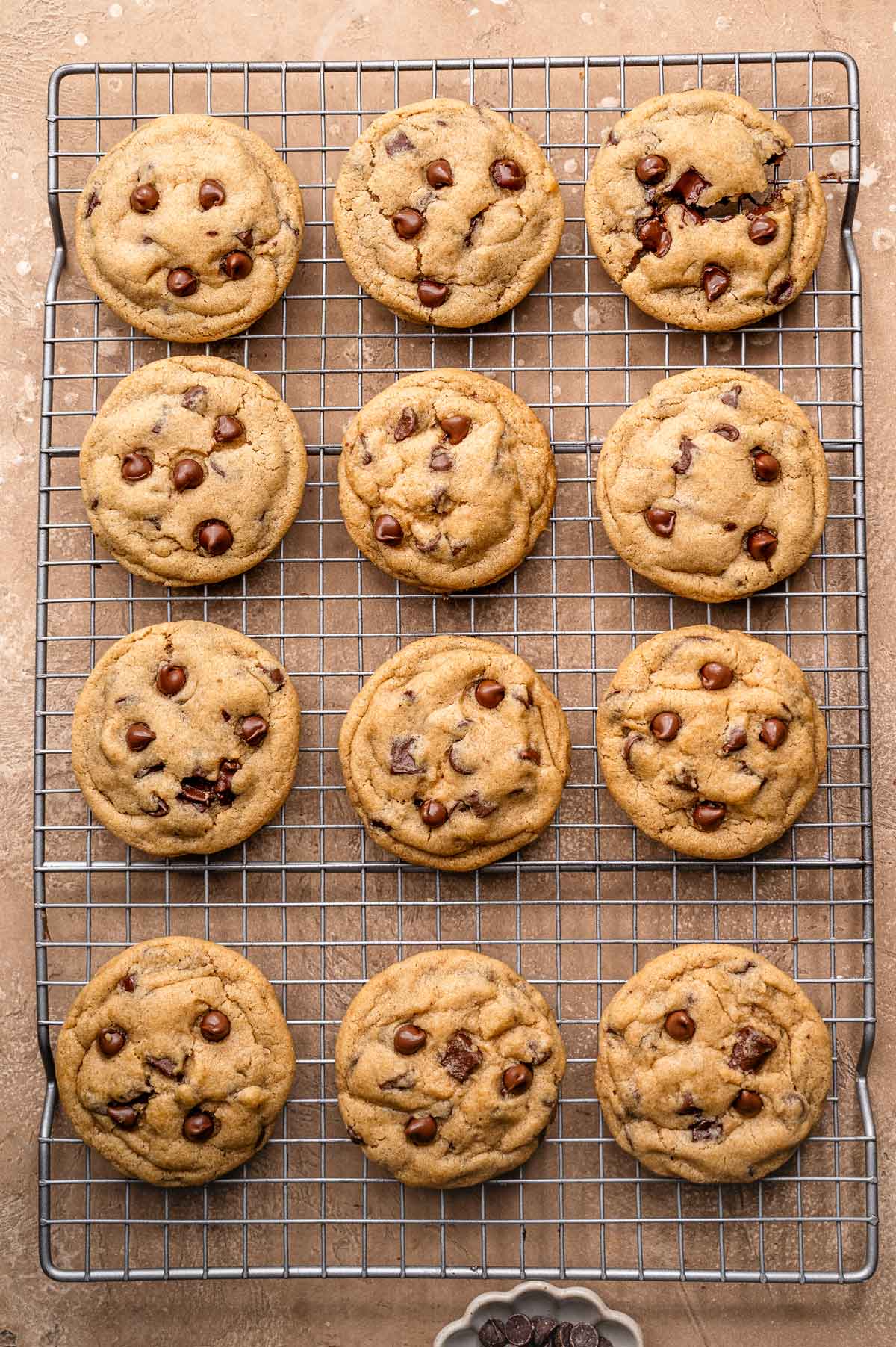 vegan chocolate chip cookies on a wire cooling rack.