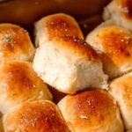 a tray of soft and fluffy vegan dinner rolls.