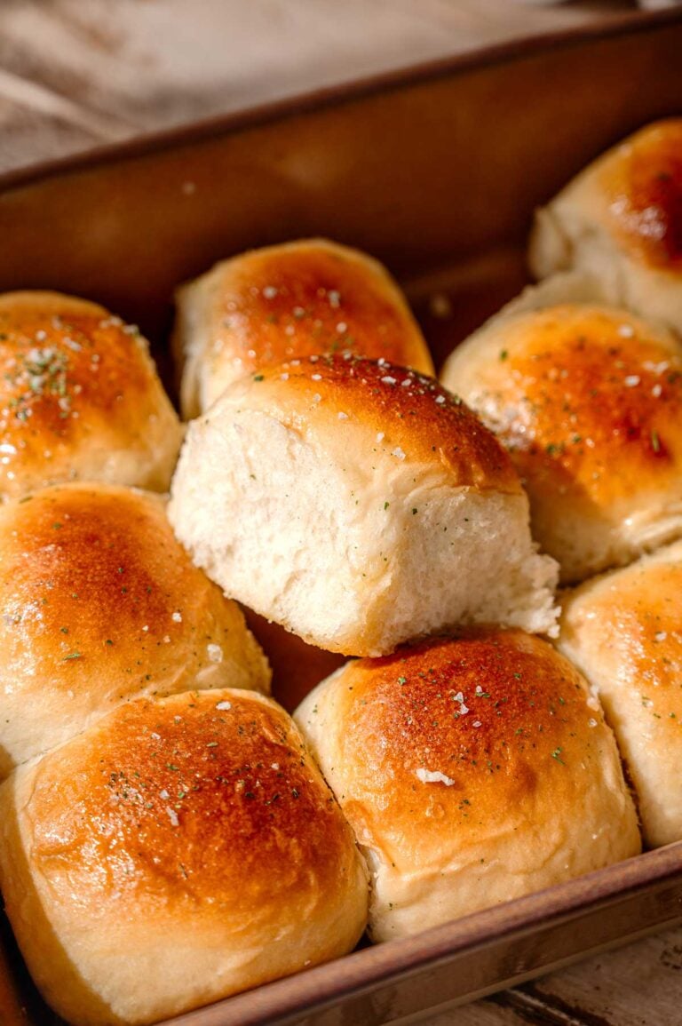 a tray of soft and fluffy vegan dinner rolls.
