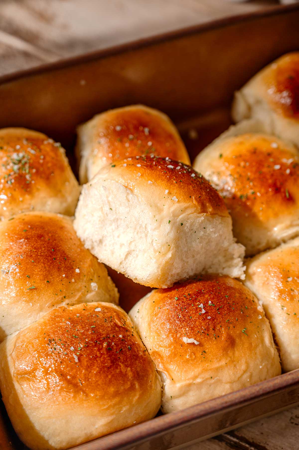 a tray of soft and fluffy vegan dinner rolls.