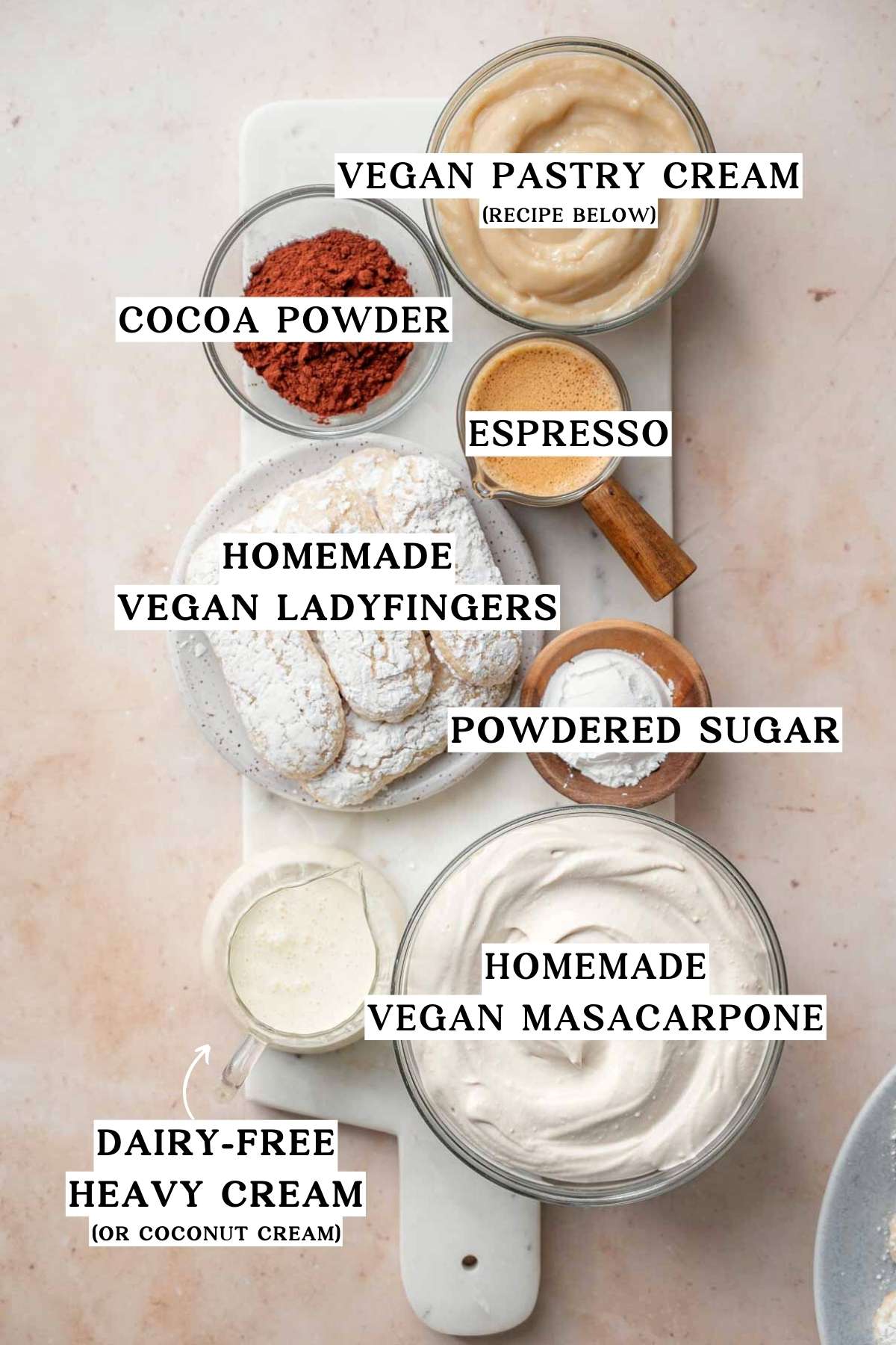 ingredients for vegan tiramisu like homemade dairy-free mascarpone cheese, espresso and cocoa powder.