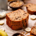 two slices of the best vegan banana bread stacked on each other.