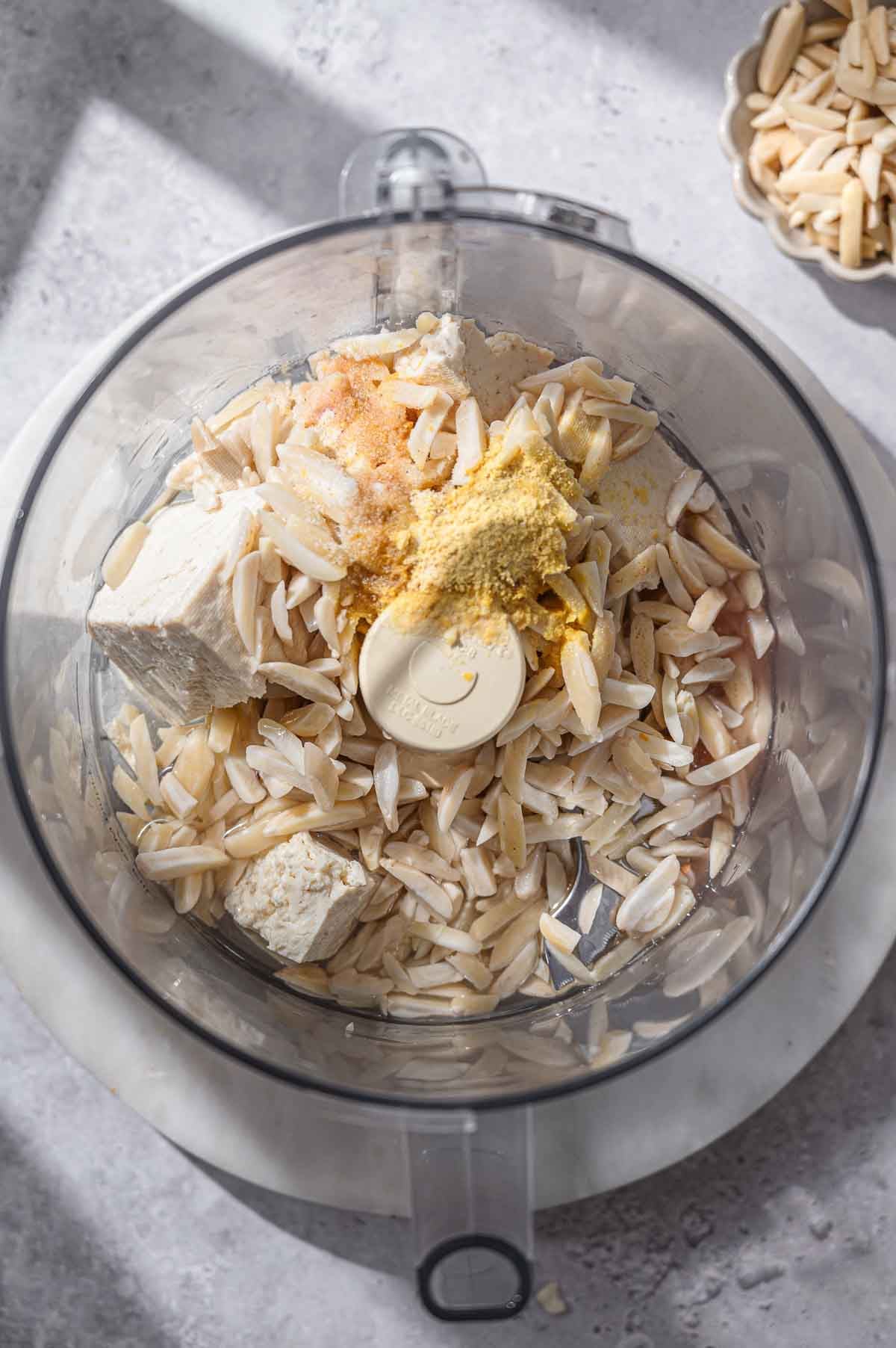 all the ingredients in a food processor bowl.