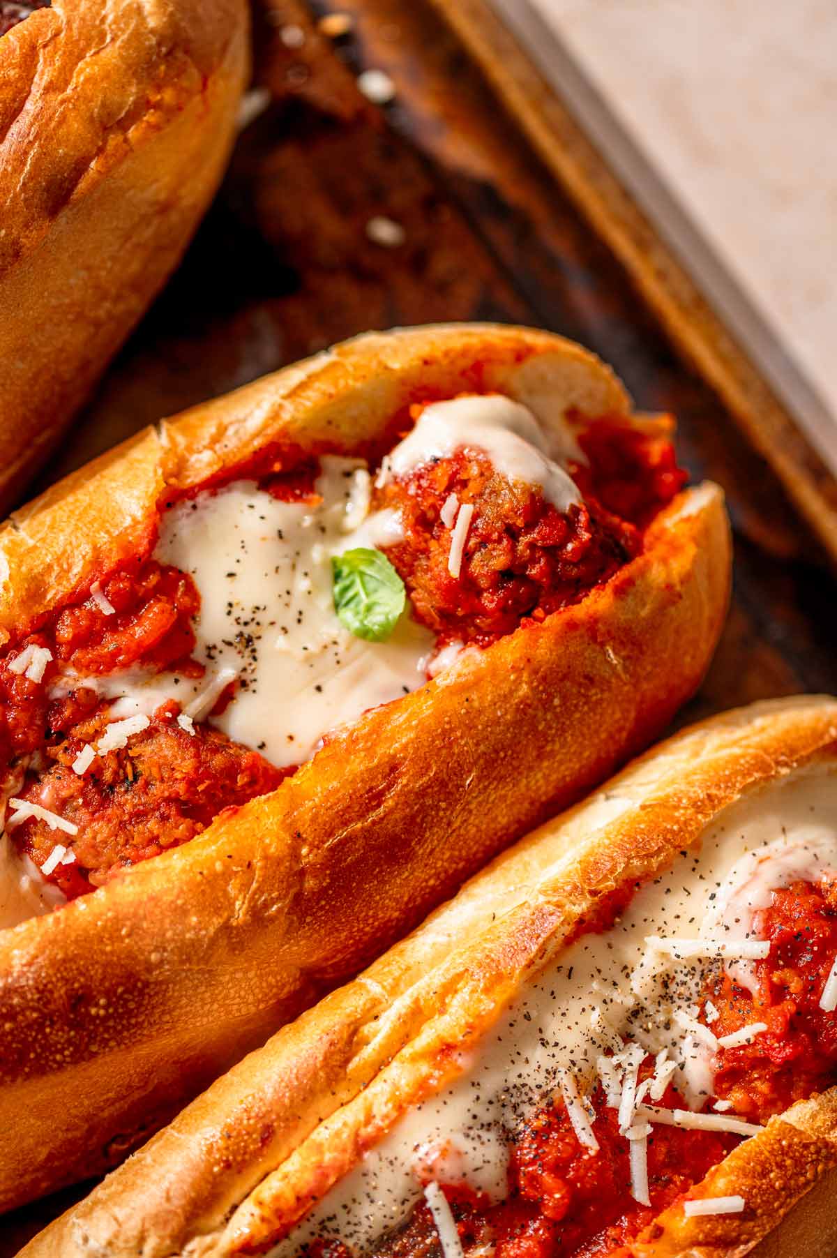 a close up of the vegan meatball inside the toasted sub.