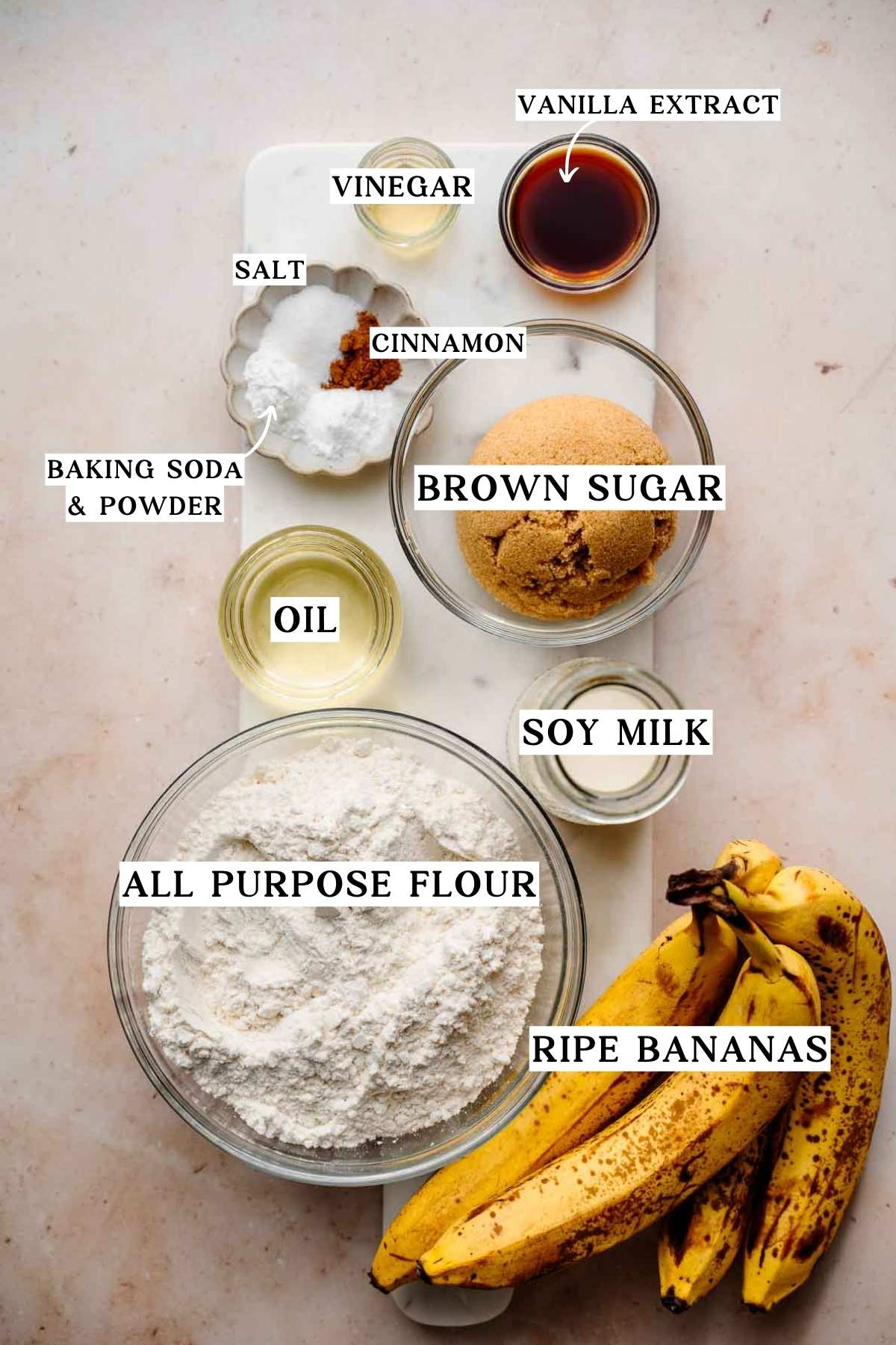 ingredients like spotty bananas, sugar, flour and oil for eggless banana bread.