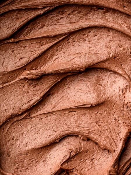 a macro close up of the dairy-free chocolate buttercream frosting.