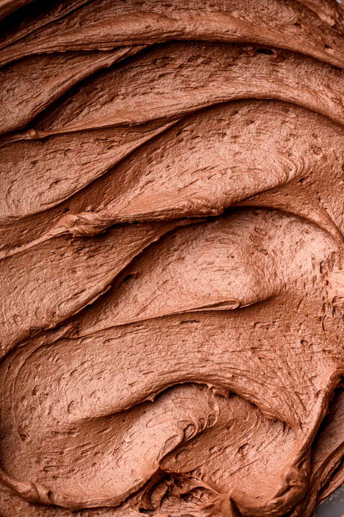 a macro close up of the dairy-free chocolate buttercream frosting.