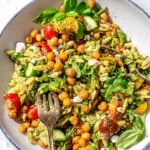 a close up of the pesto orzo salad with chickpeas.