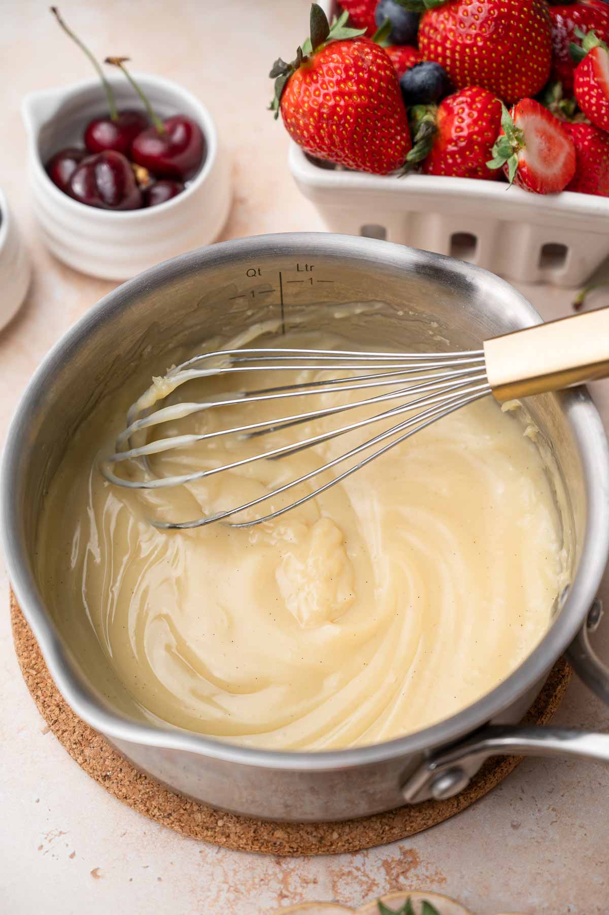 the thickened vegan custard in a pot.
