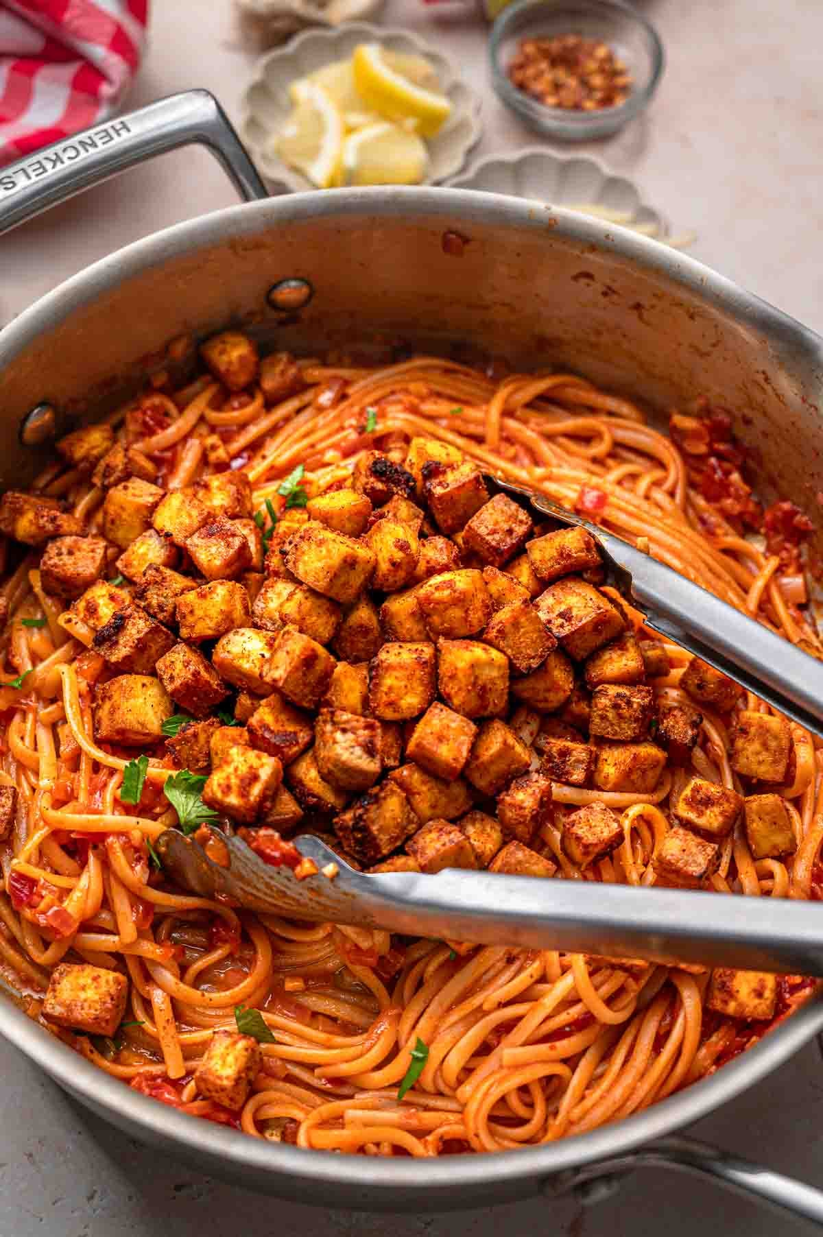 the crisp air fryer paprika tofu on the tossed chili flake linguine.