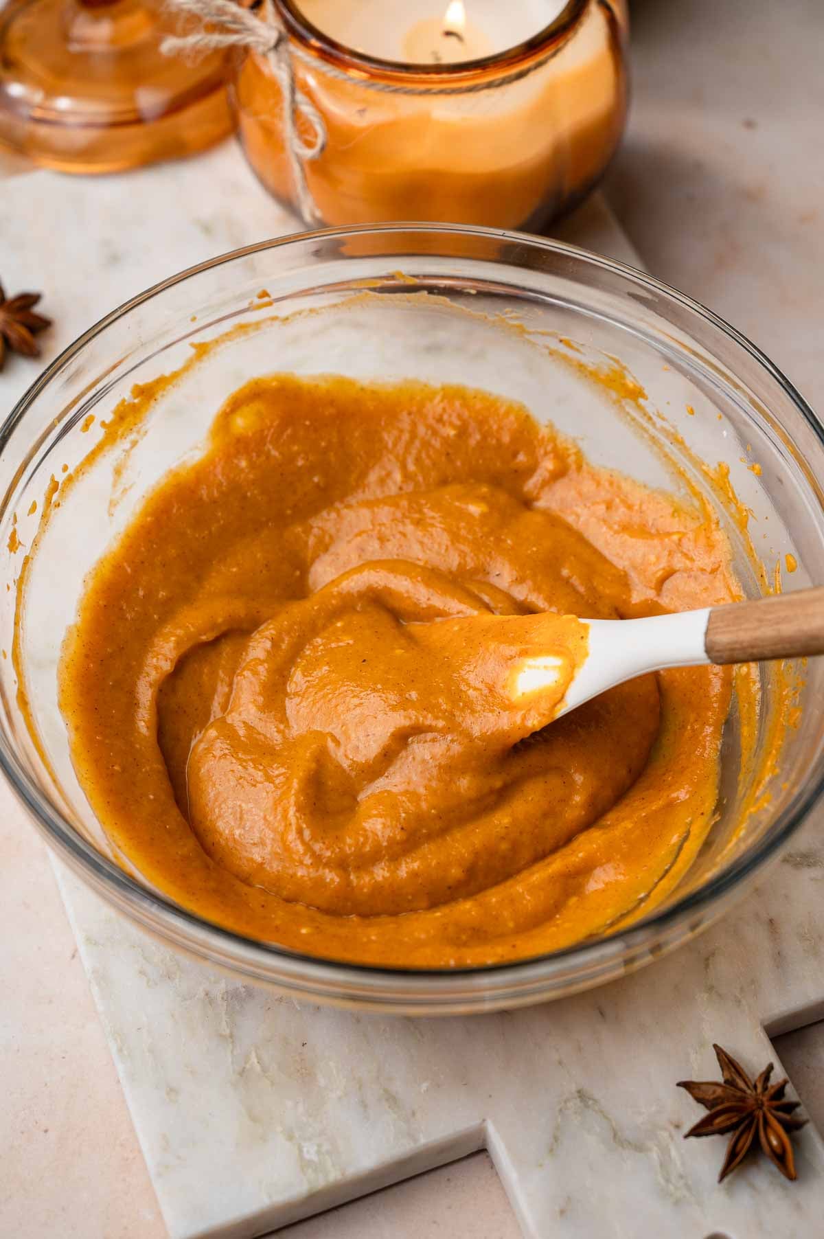 dairy-free pumpkin cheesecake filling in a glass bowl.